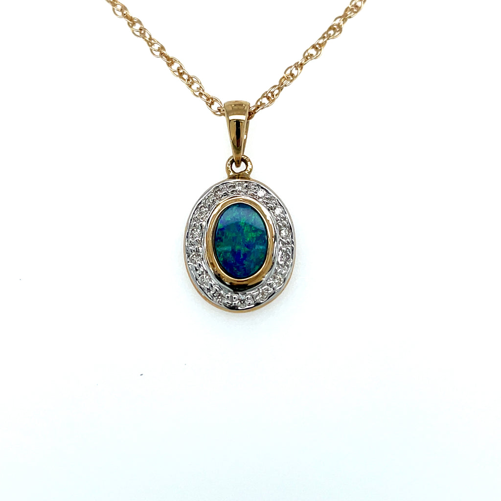 Lady's Yellow 14 Karat boulder Opal doublet pendant with diamond